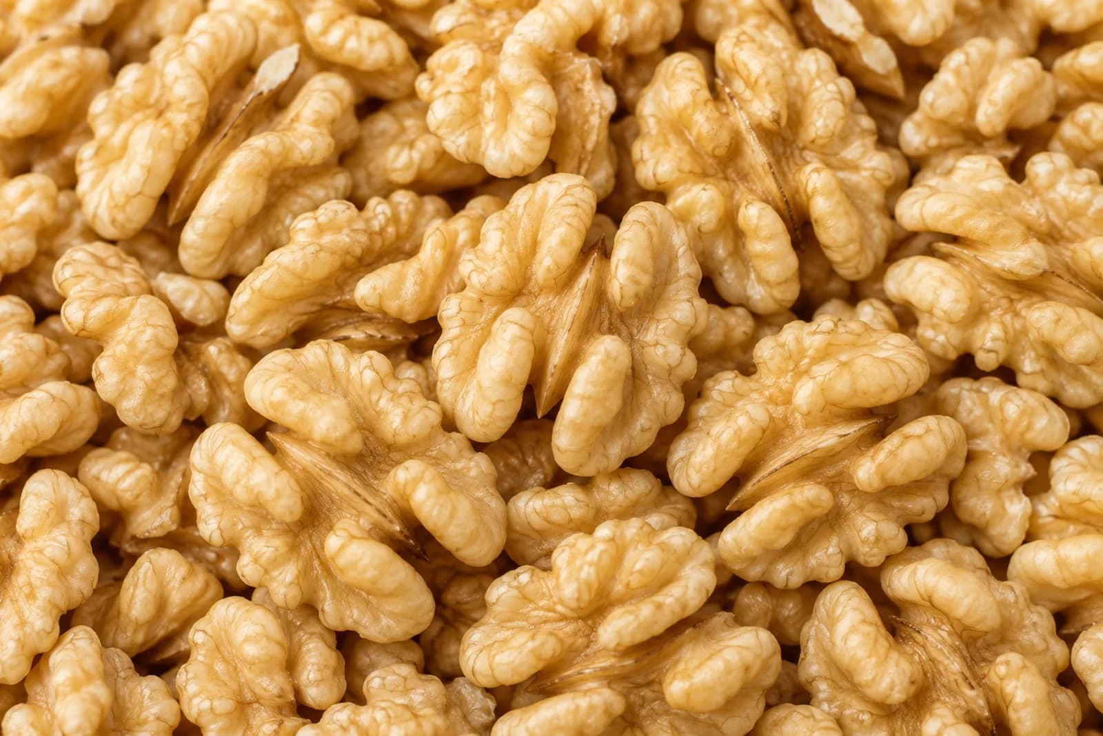 Nueces Chandler de alta calidad para exportación Nueces Chandler argentinas de calibre grande - Fondo decorativo de frutos secos premium